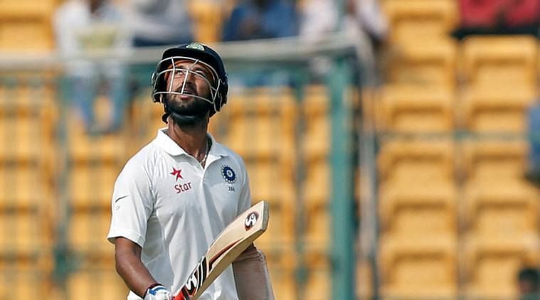 Image result for Cheteshwar Pujara â 92 vs Australia (Bangalore, 2017)